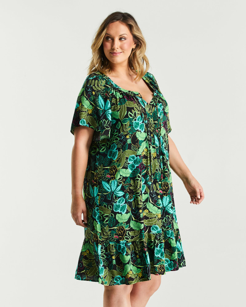 Side of a model wearing a size 1X Wild Heart Dress in Print by Estelle. | dia_product_style_image_id:253797